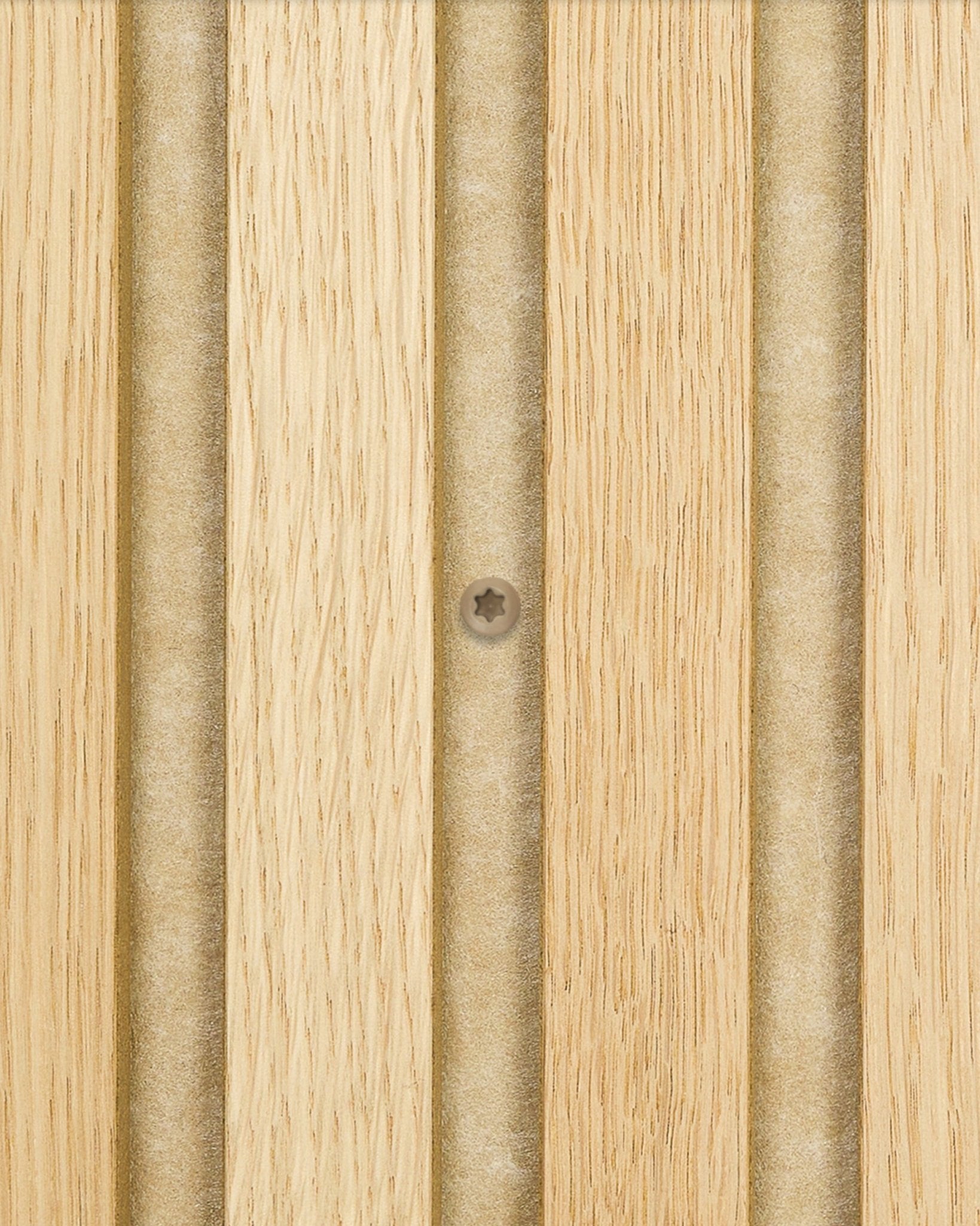 Close-up of beige WoodUpp installation screws securing Akupanel light wood acoustic paneling with vertical grooves; box contains 100 pieces.